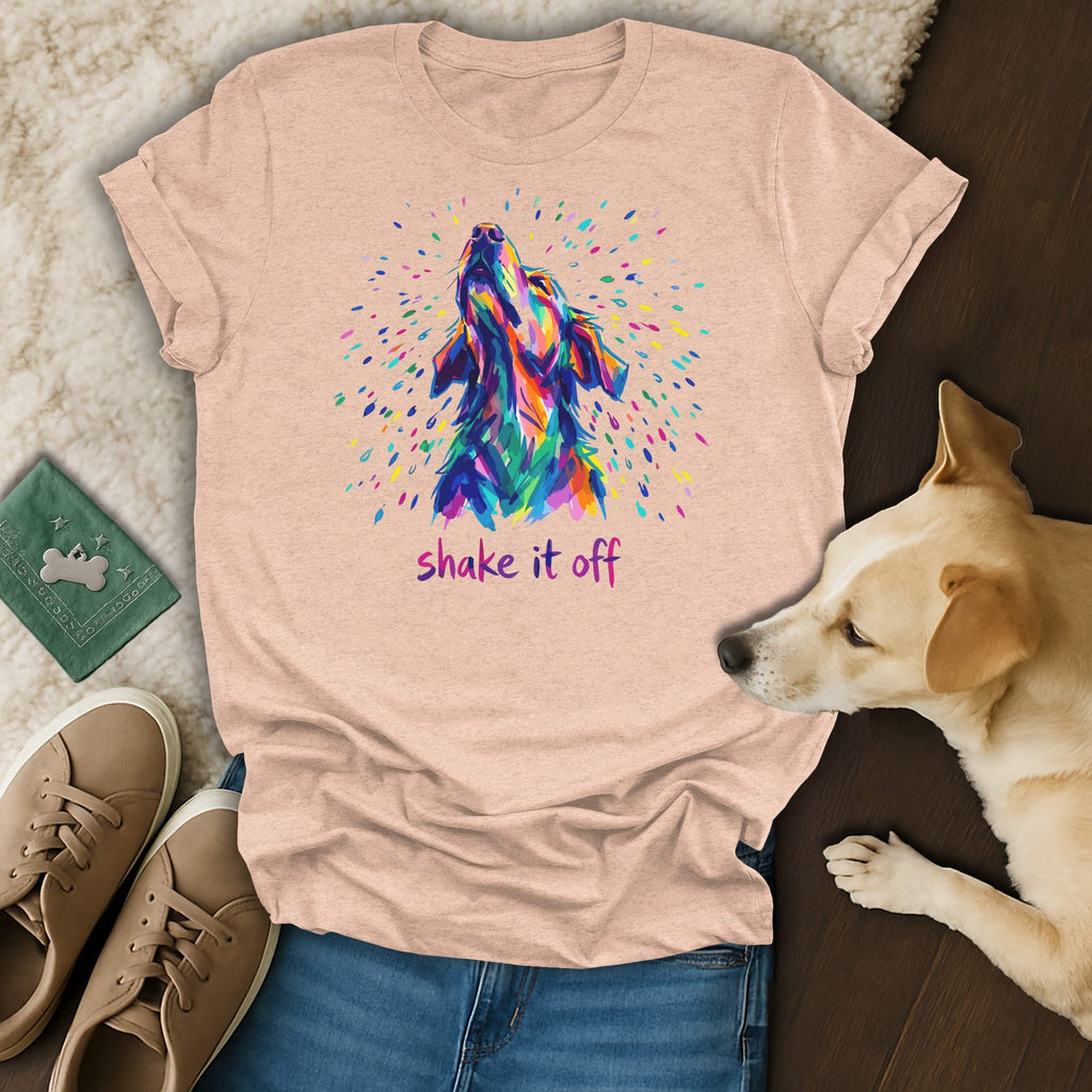 Peach t-shirt with colorful dog head graphic and "shake it off" text.