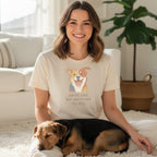 Woman wearing cream t-shirt with cartoon dog graphic and text "you're cool, but you're not my dog."