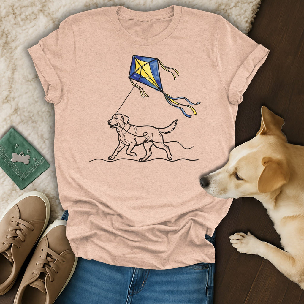 T-shirt with a line drawing of a dog flying a kite.