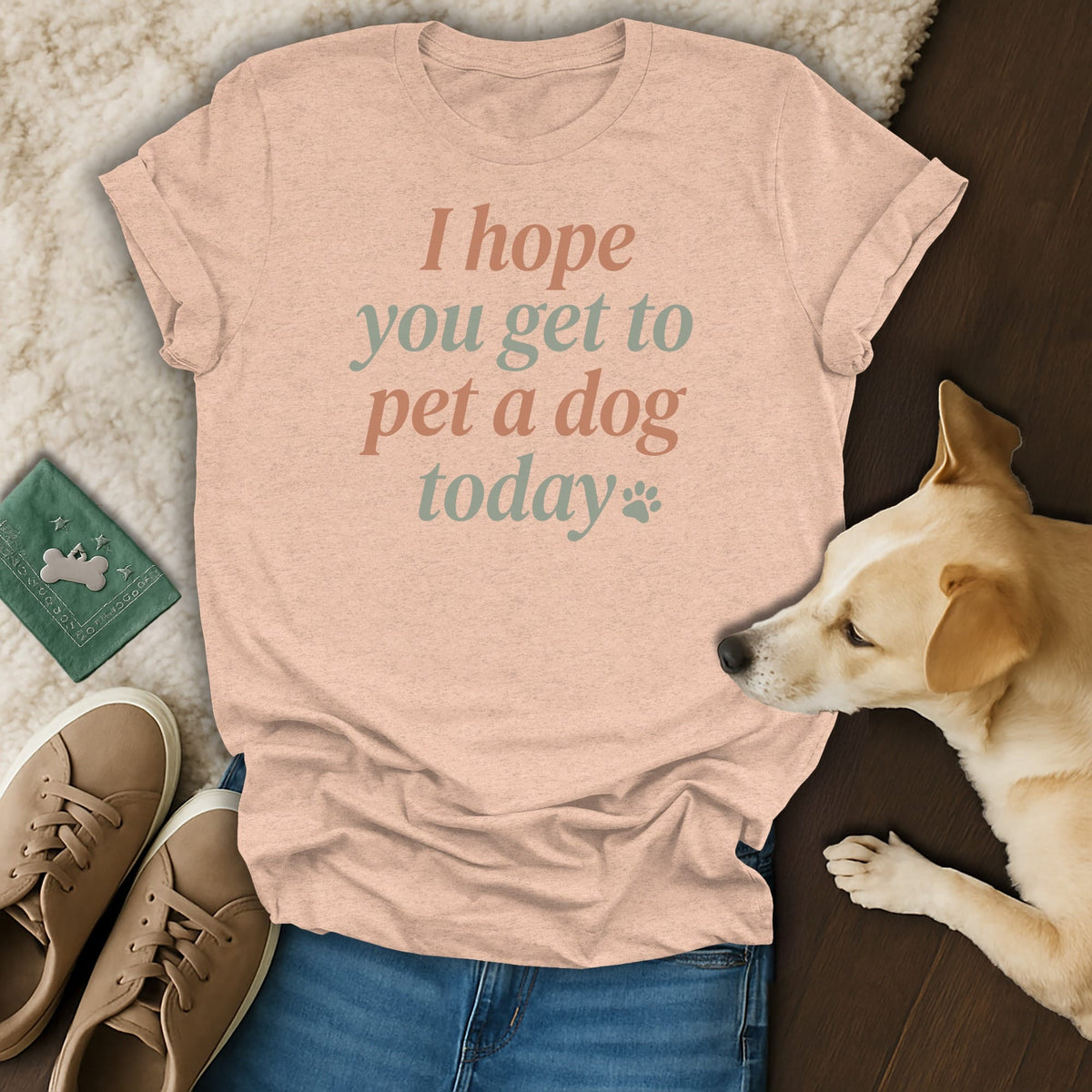 Peach t-shirt with text "I hope you get to pet a dog today" and a dog.