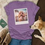 Purple t-shirt with a polaroid print of a dog wearing heart sunglasses eating ice cream.