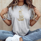 Light grey t-shirt with gold dog graphic and "my therapist says WOOF" text.