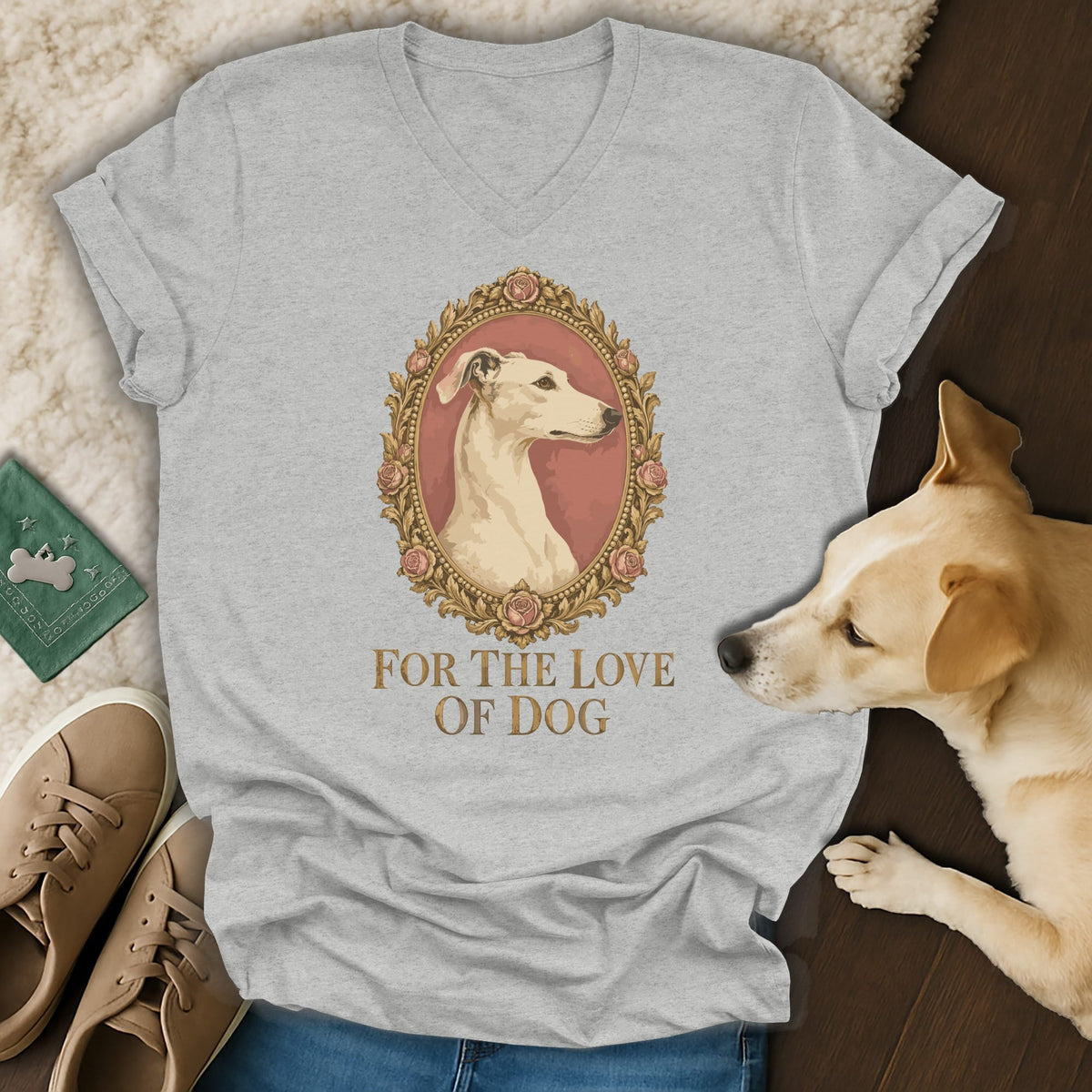 A light gray v-neck t-shirt featuring a dog portrait graphic, surrounded by a golden frame and text that reads FOR THE LOVE OF DOG.