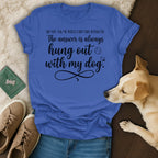 Blue t-shirt with text "The answer is always hung out with my dog."