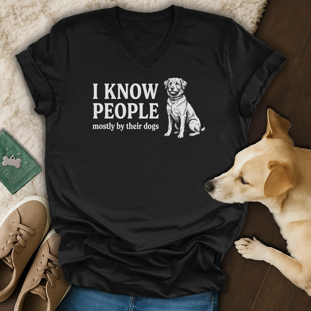 Black v-neck t-shirt with "I KNOW PEOPLE mostly by their dogs" and dog graphic.
