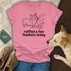 Pink t-shirt with a corgi and duck graphic and text "ruffled a few feathers today".