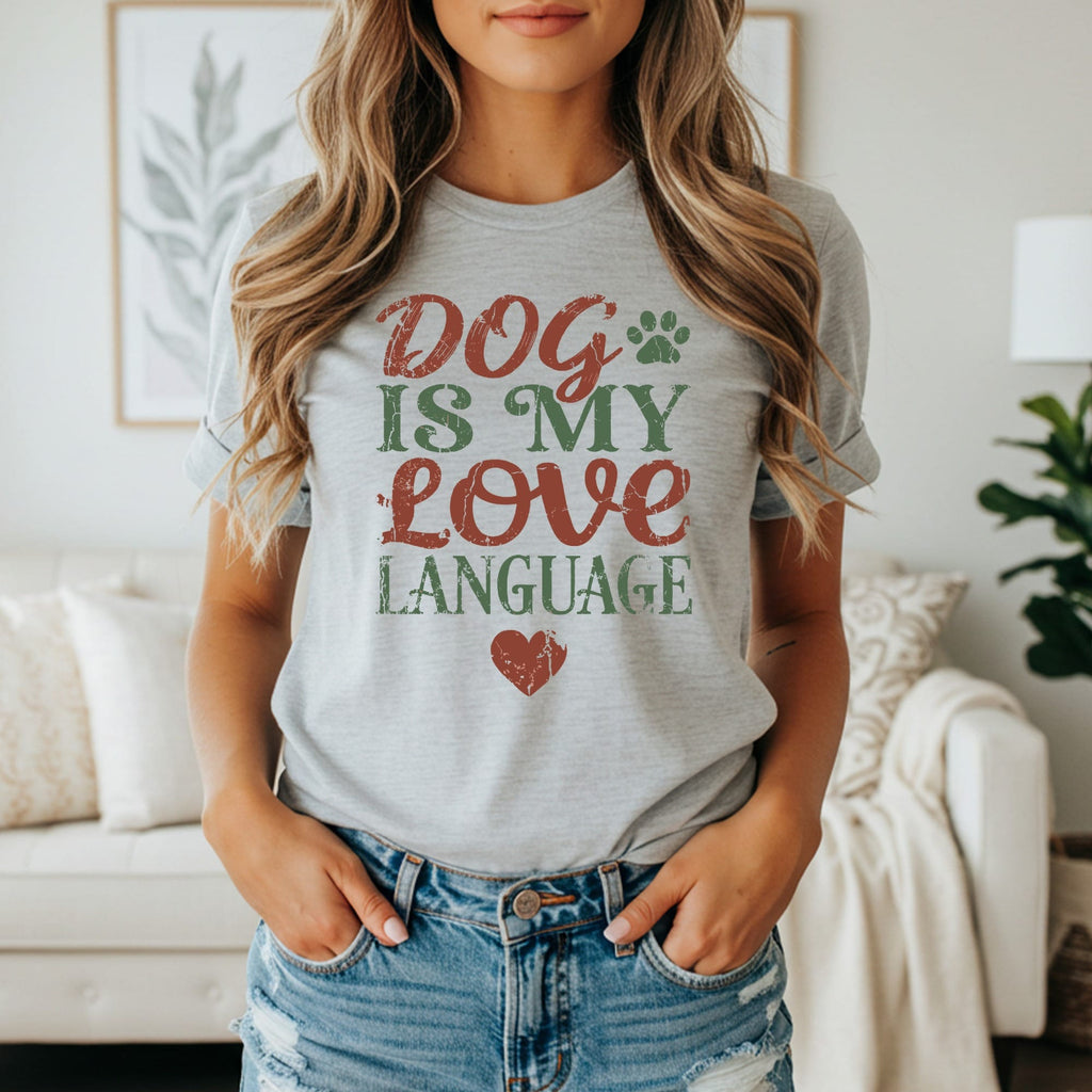 Grey t-shirt with "Dog is my love language" text and paw print graphic.