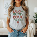 Grey t-shirt with "Dog is my love language" text and paw print graphic.