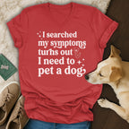 Red t-shirt with white text "I searched my symptoms turns out I need to pet a dog".