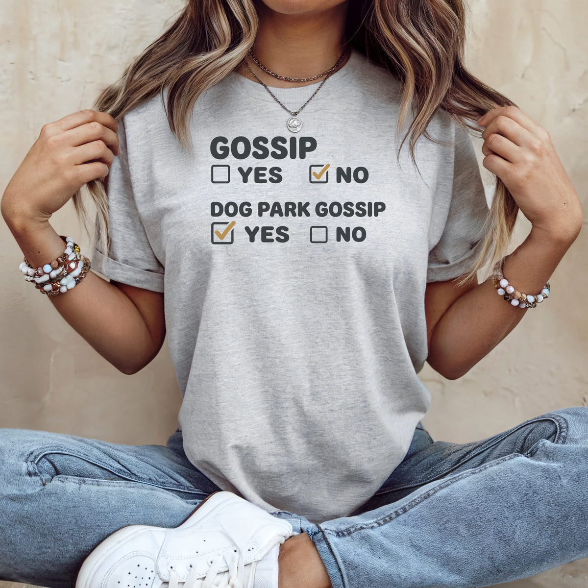 Gray t-shirt with "GOSSIP YES NO" and "DOG PARK GOSSIP YES NO" text.