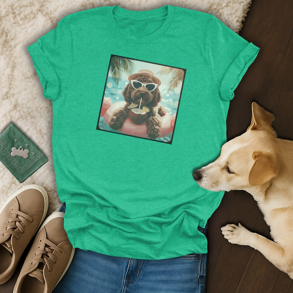 Green t-shirt with graphic of a dog wearing sunglasses and a hat on a float.