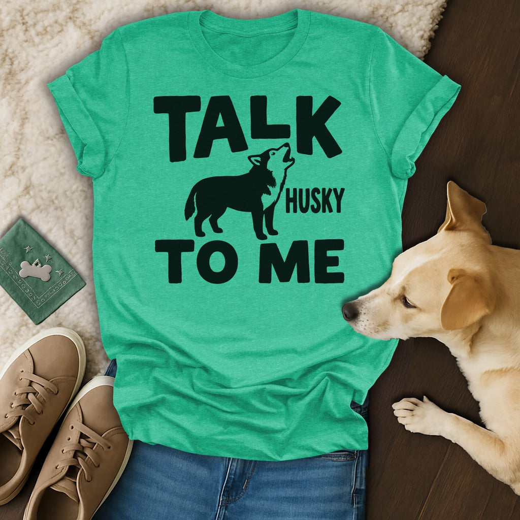 Green t-shirt with "TALK HUSKY TO ME" text and silhouette of a howling husky.