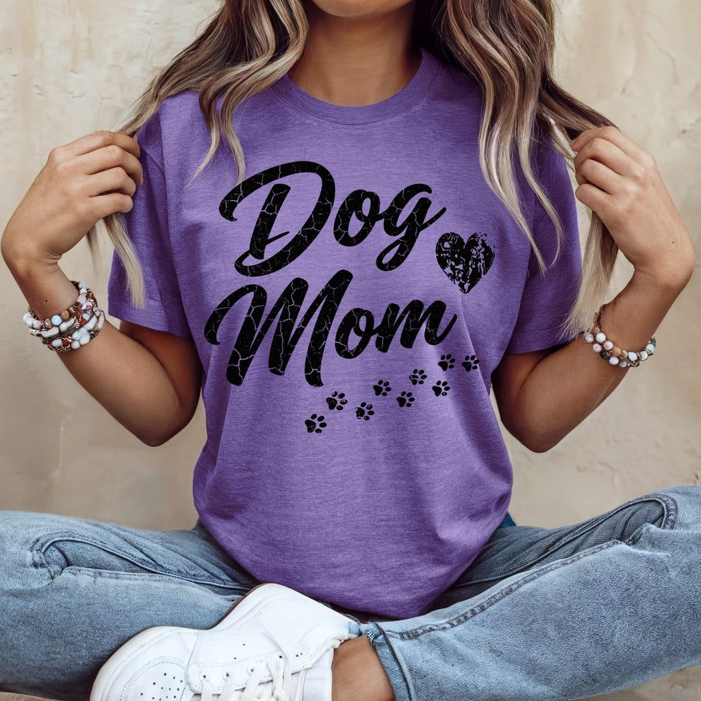 Purple t-shirt with "Dog Mom" text and paw prints.