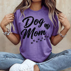 Purple t-shirt with "Dog Mom" text and paw prints.