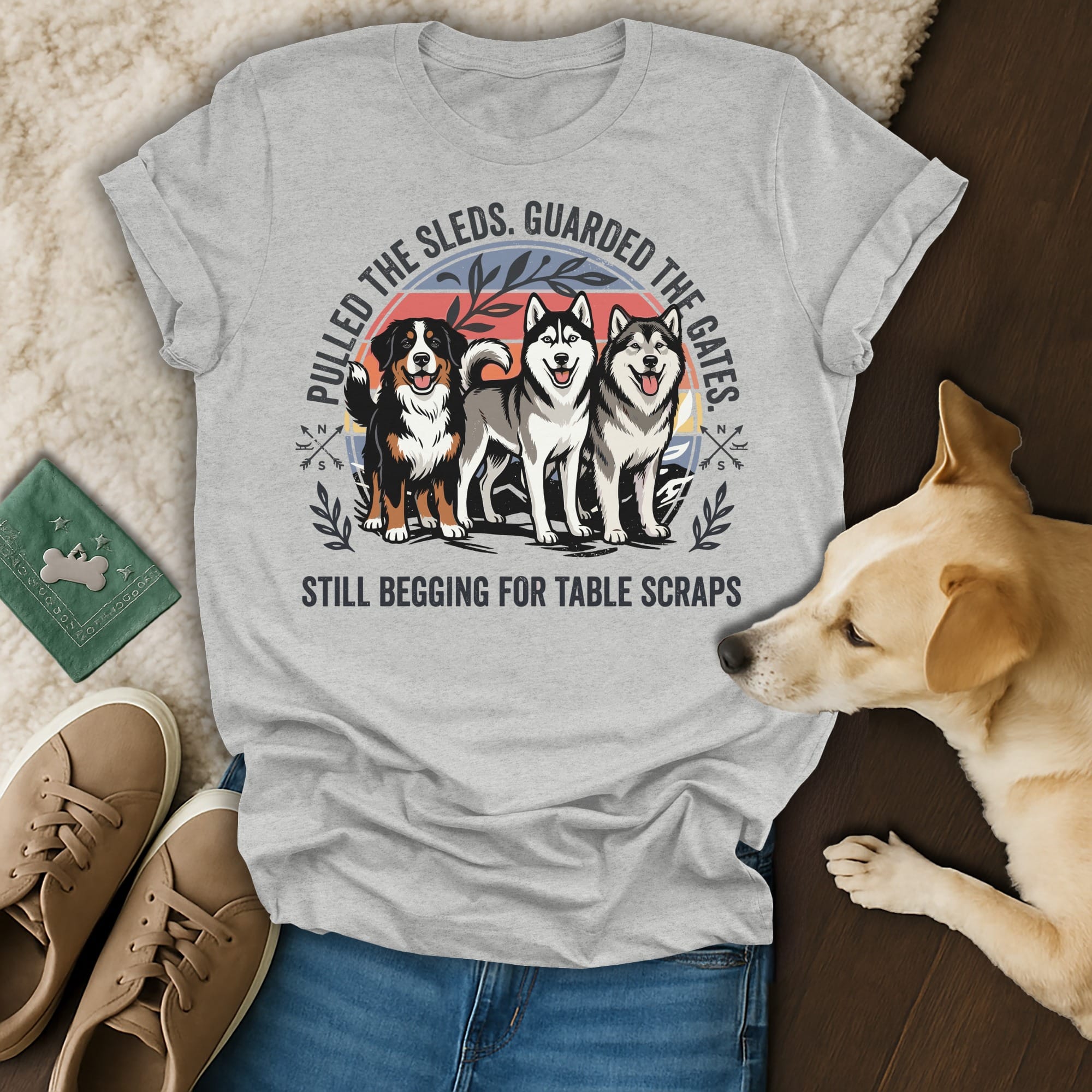 Gray t-shirt with three dogs and text about guarding gates and begging for scraps.