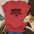 Red v-neck t-shirt with "BOOP RESPONSIBLY" text and a dog graphic.