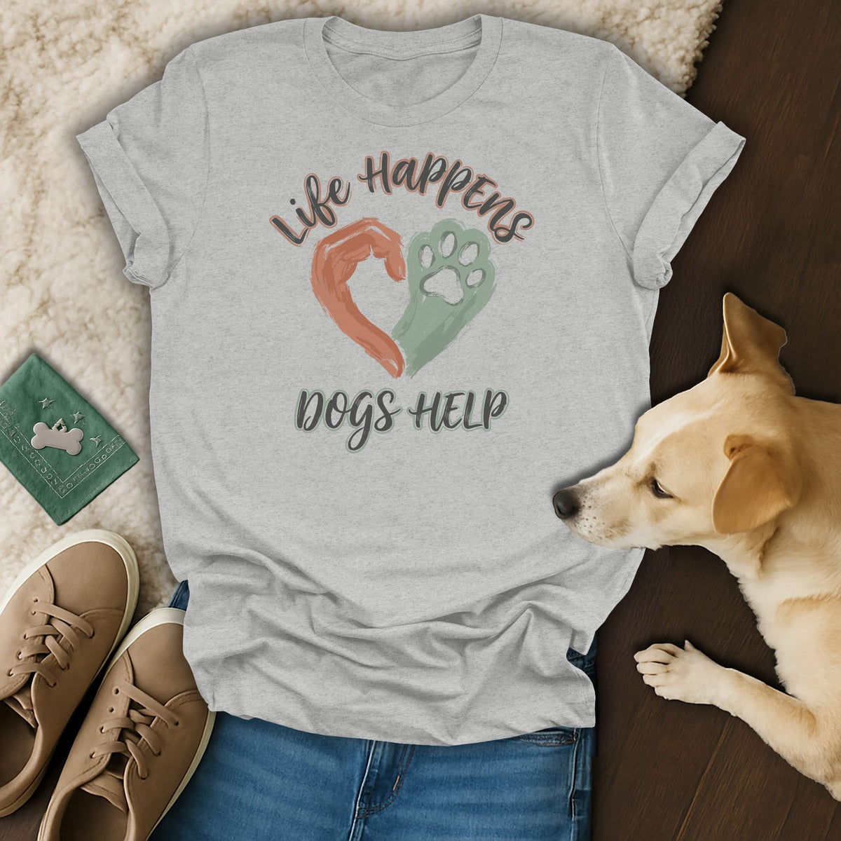 Grey t-shirt with "Life Happens dogs HELP" text and heart symbol made from a hand and paw.