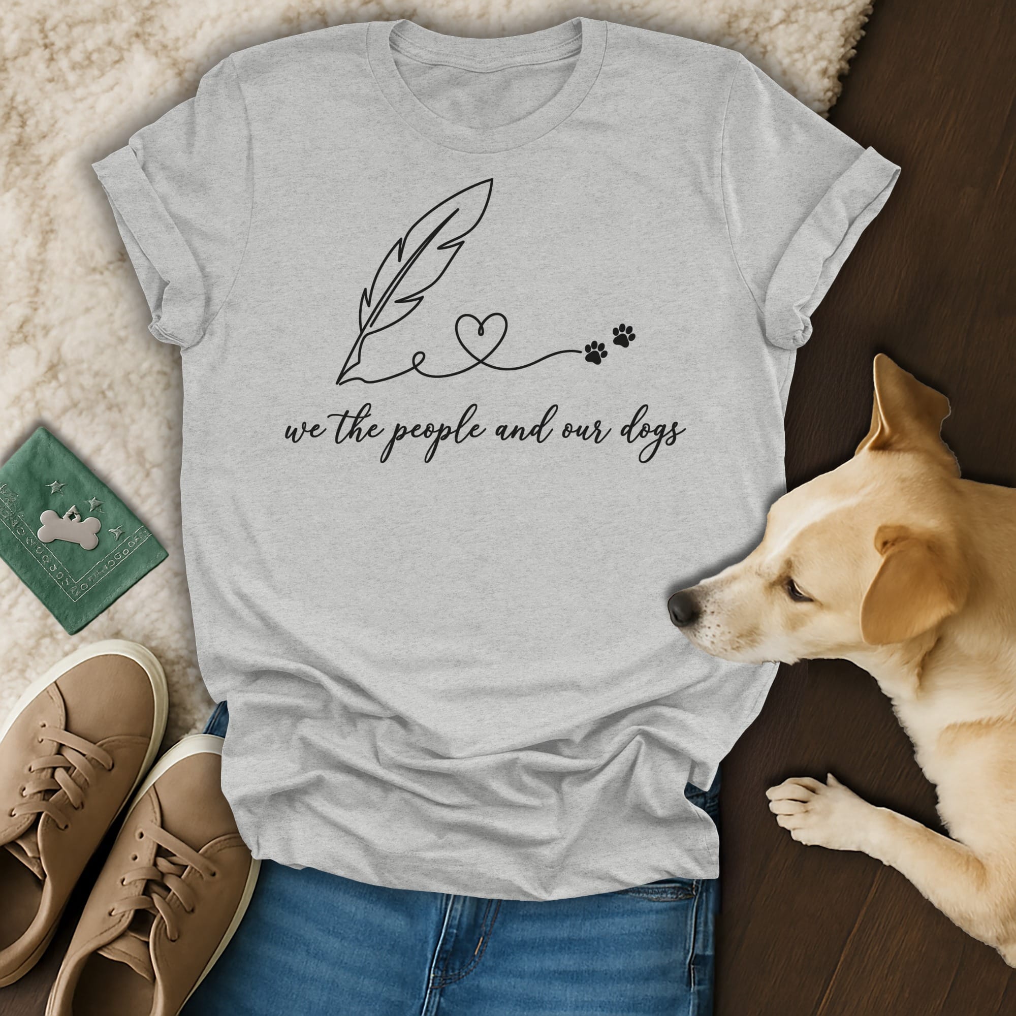 Gray t-shirt with "we the people and our dogs" text and paw prints.