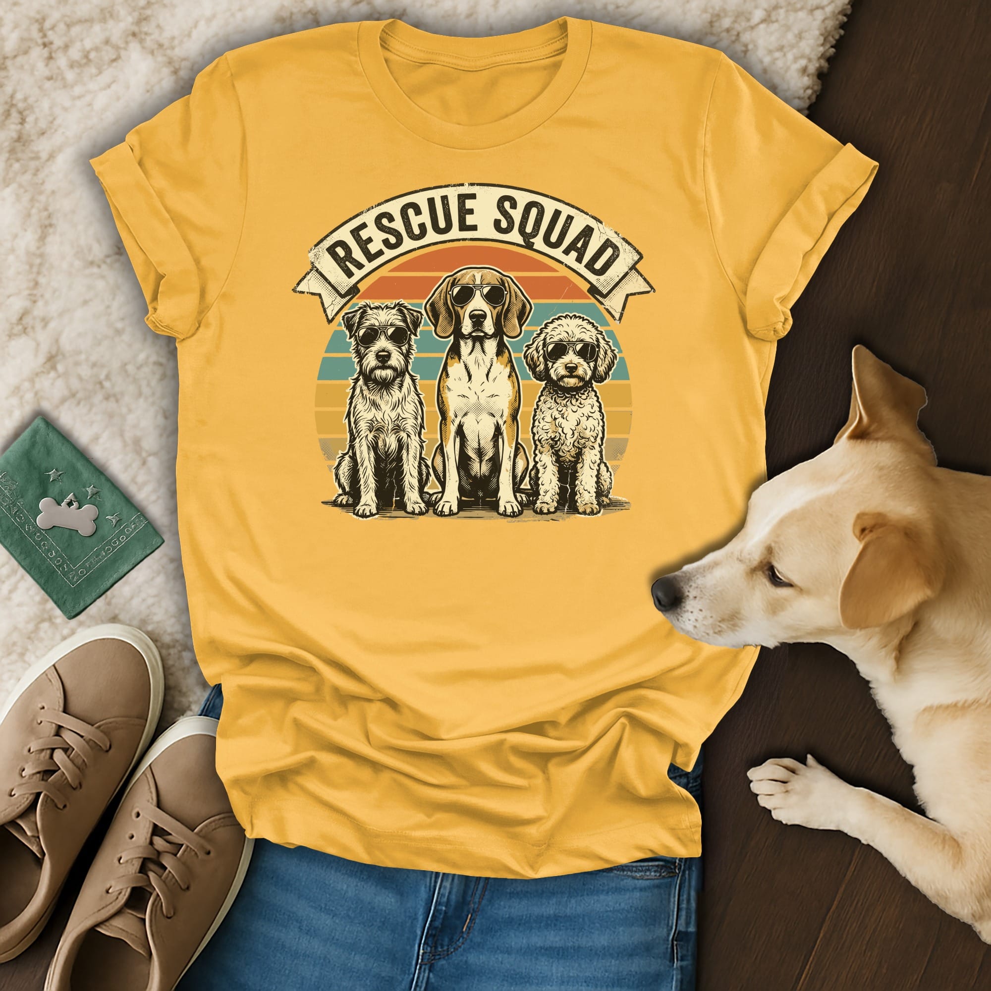 Three dogs in a t-shirt graphic with "Rescue Squad" text.