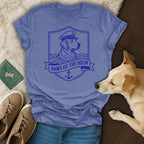 Blue t-shirt with a crest featuring a dog in a captain's hat, anchor, and "Paws of the Helm" text.