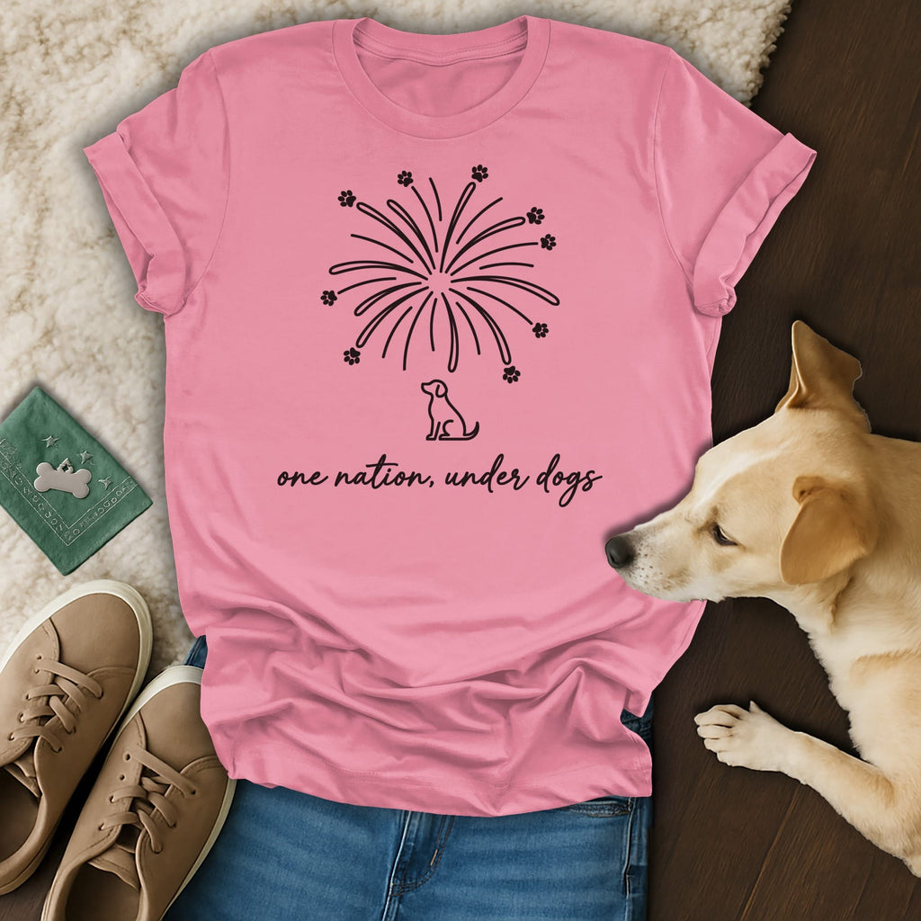 Pink t-shirt with fireworks and a dog silhouette, text "one nation, under dogs".