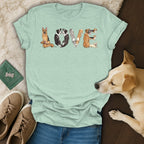 Light blue t-shirt with the word "LOVE" spelled out by various dogs.
