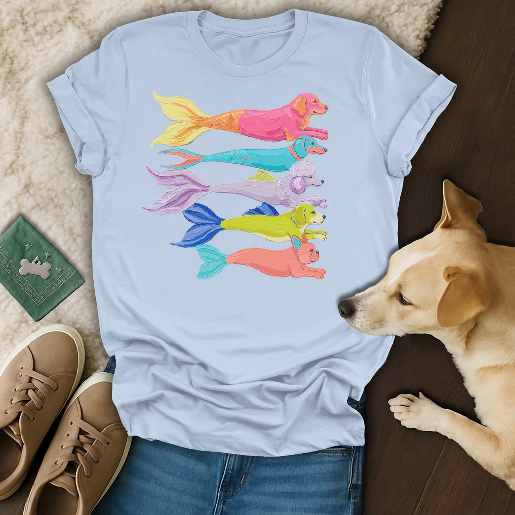Light blue t-shirt with colorful dog-mermaid designs and a yellow lab dog.