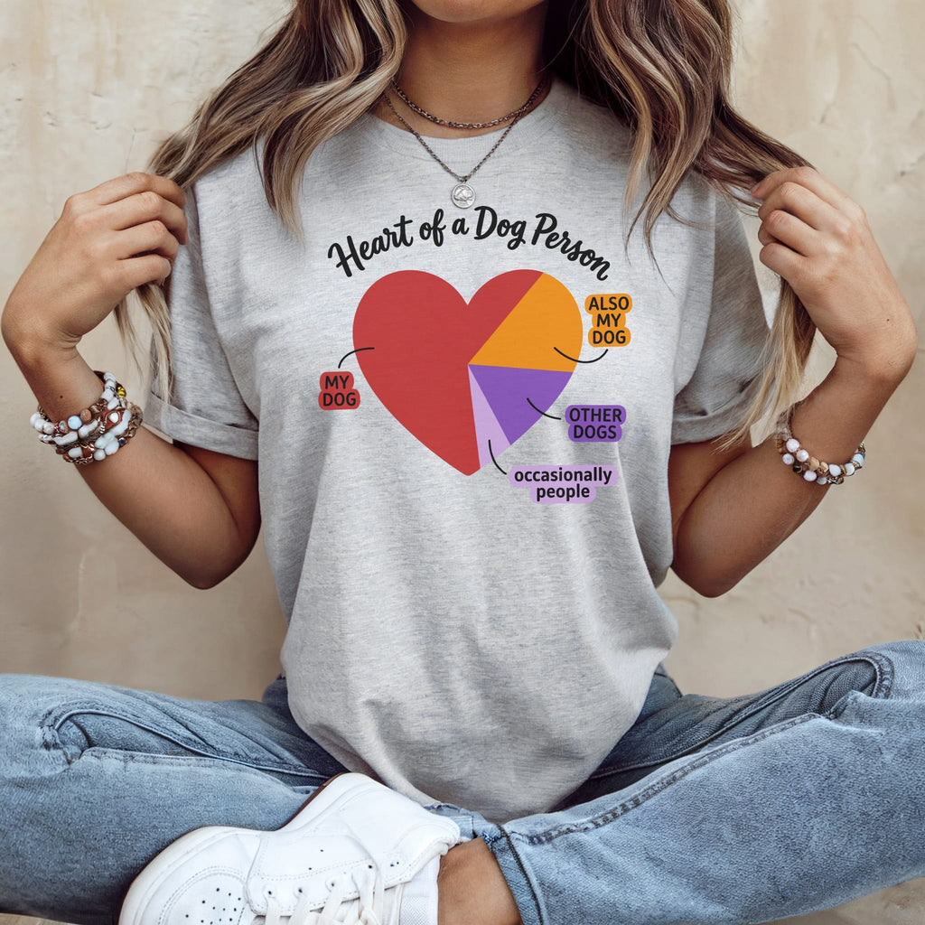 Grey t-shirt with a pie chart heart graphic and text about dogs.