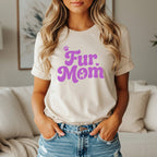 Cream t-shirt with purple "Fur Mom" text and paw print graphic.