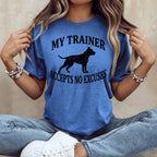 Blue t-shirt with black text and dog silhouette: "MY TRAINER ACCEPTS NO EXCUSES".