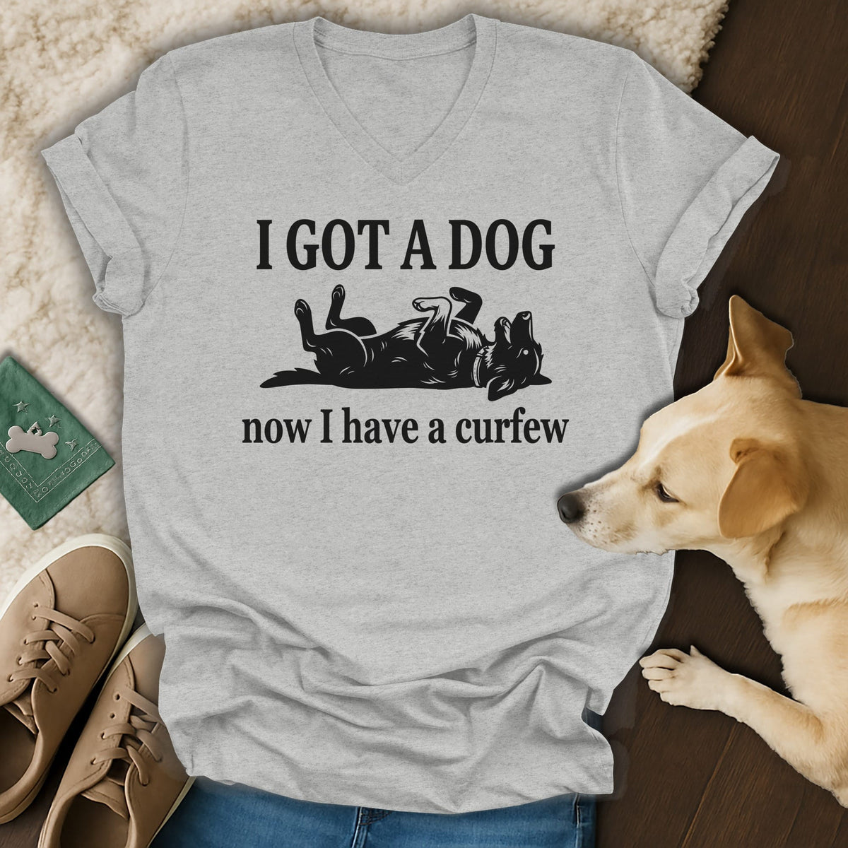 Grey t-shirt with "I GOT A DOG now I have a curfew" text and dog graphic.