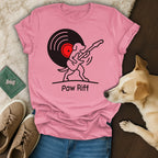 Pink t-shirt with a dog playing guitar with a vinyl record, text "Paw Riff".