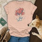 Peach t-shirt with dachshund and heart balloons graphic.
