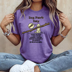 Purple t-shirt with dog and stick illustration and funny text about the dog park.