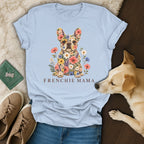 A light blue t-shirt with a floral French Bulldog illustration and the text FRENCHIE MAMA.