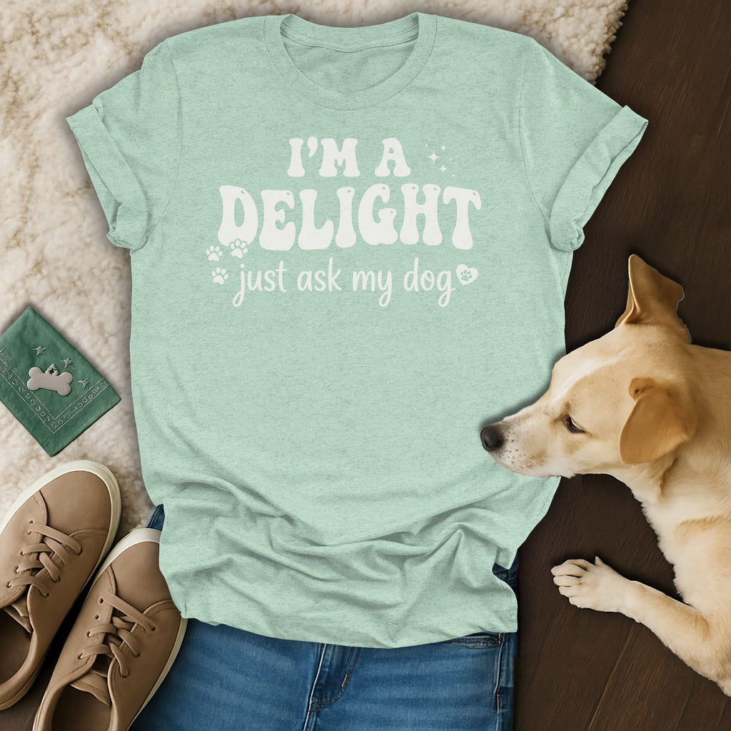 Light teal t-shirt with "I'M A DELIGHT, just ask my dog" text.