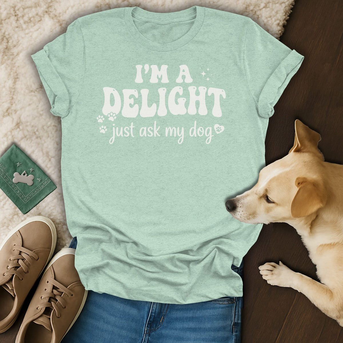 Light teal t-shirt with "I'M A DELIGHT, just ask my dog" text.