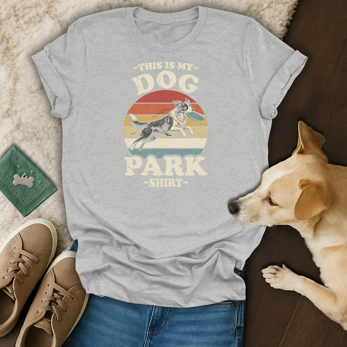 Grey t-shirt with vintage graphic "This is my dog park shirt" and dog playing frisbee.