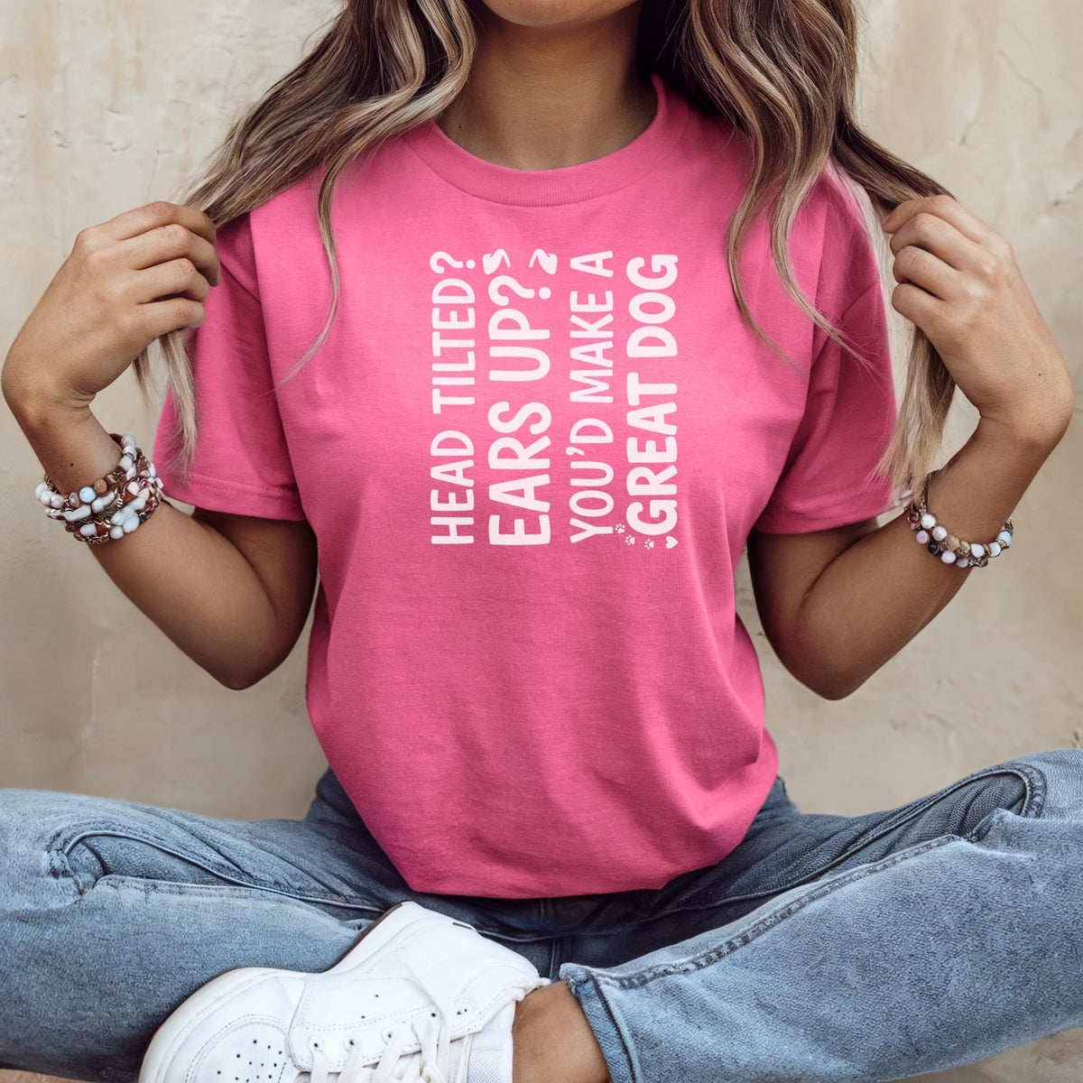 Pink t-shirt with white text: "HEAD TILTED? EARS UP? YOU'D MAKE A GREAT DOG"