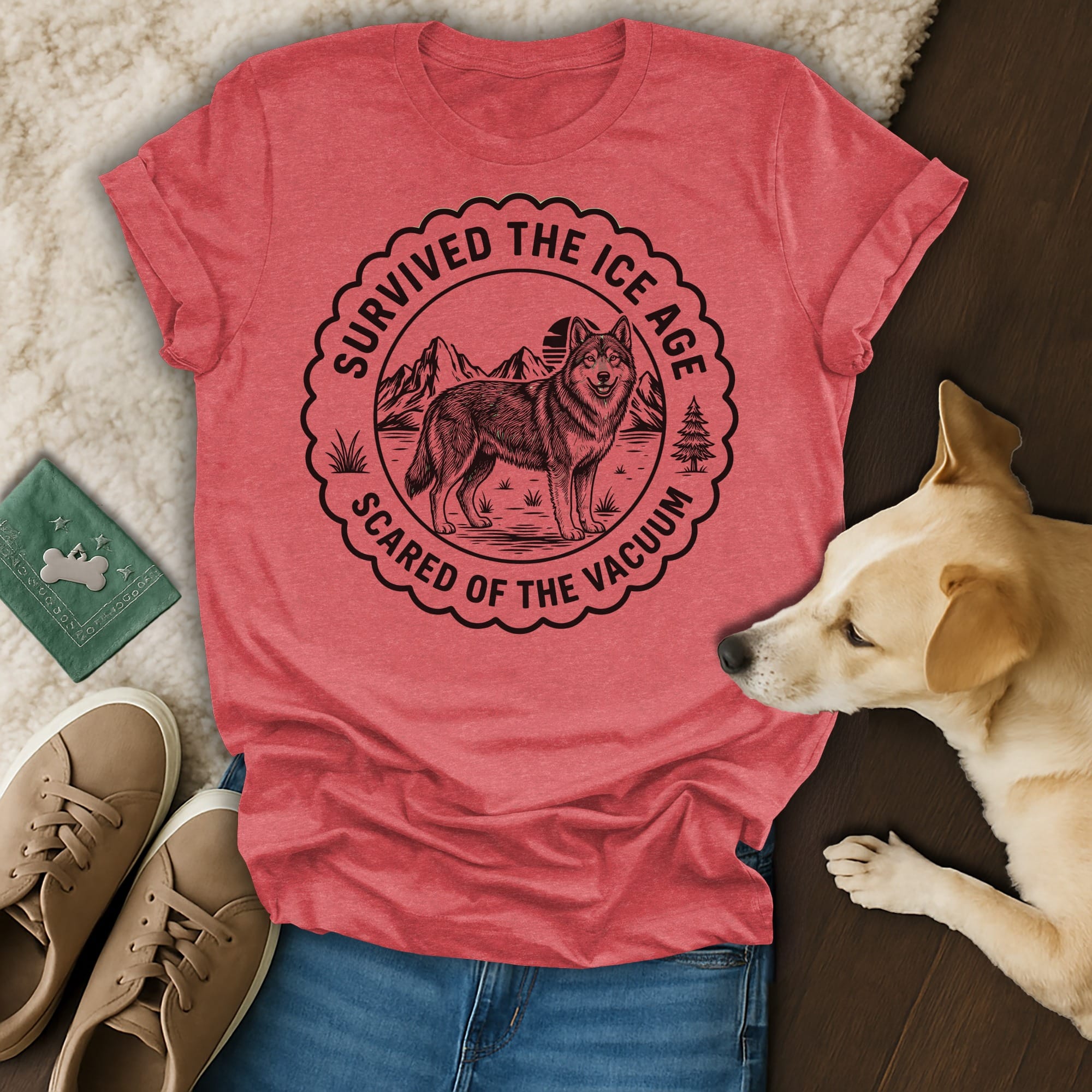 Red t-shirt with "Survived the Ice Age Scared of the Vacuum" text and wolf graphic.