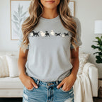 Grey t-shirt with dogs in ghost costumes graphic across the chest.