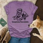T-shirt with graphic of a dog wearing sunglasses on a beach towel with a drink.