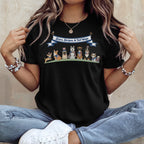 Black t-shirt with patriotic dogs and "Stars, Stripes, & Tail Wags" banner.