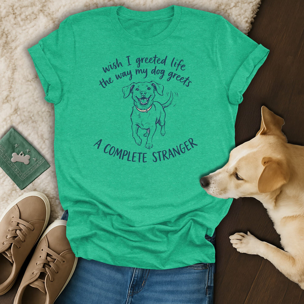 Green t-shirt with text "wish I greeted life the way my dog greets a complete stranger" and a dog illustration.
