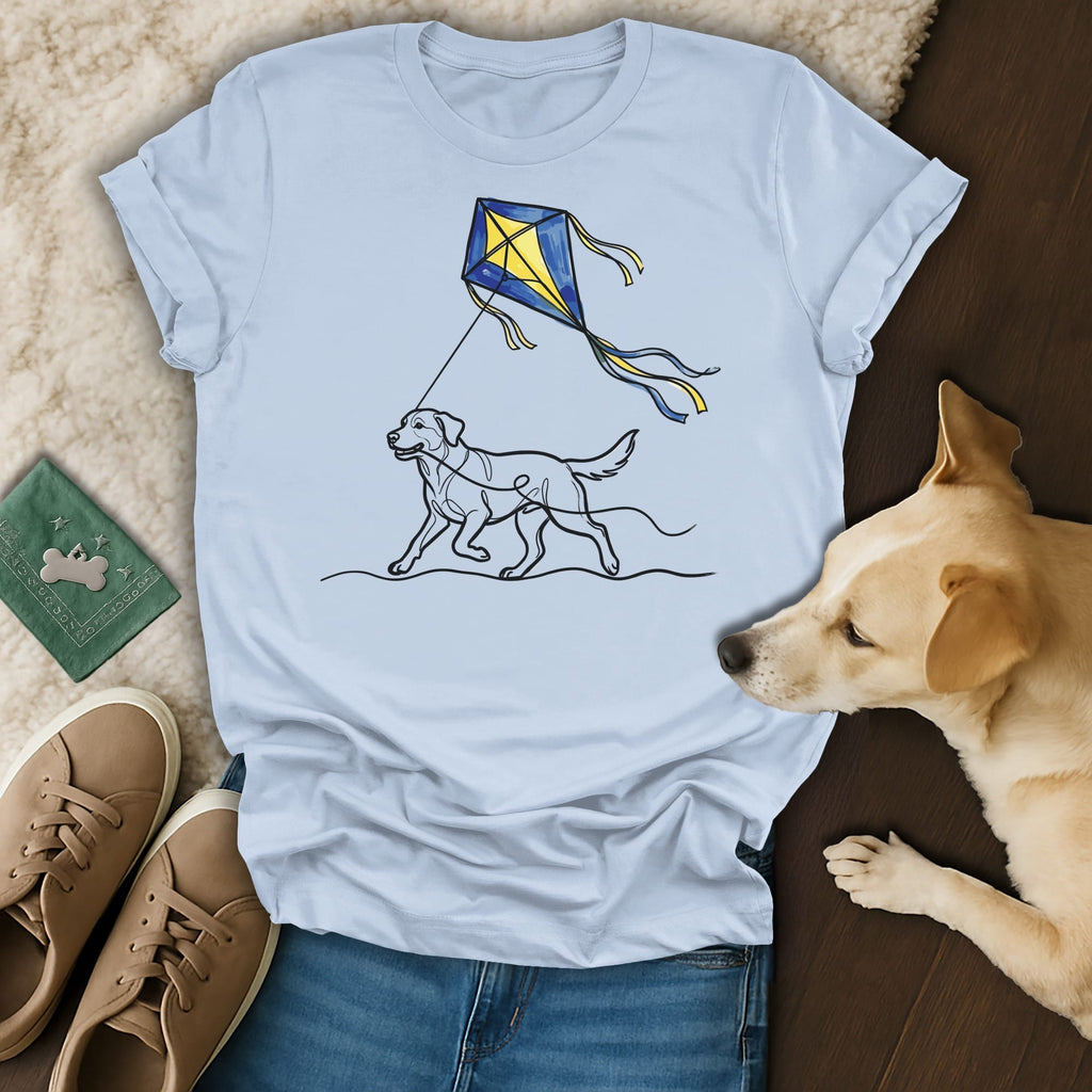 Light blue t-shirt with a line drawing of a dog flying a kite.