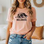 Peach t-shirt with black graphic of sleeping bulldog and text "BULLDOZER.".