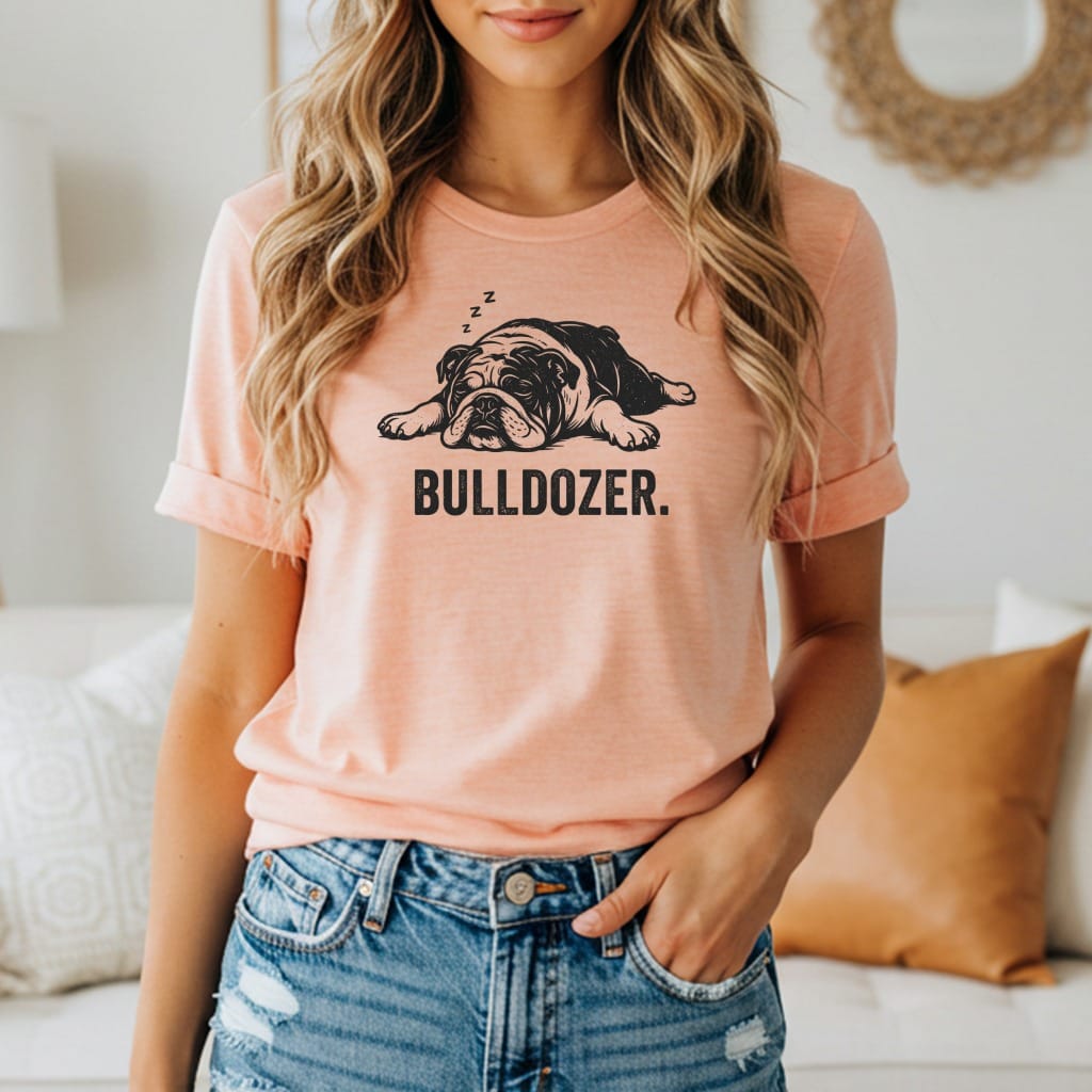 Peach t-shirt with black graphic of sleeping bulldog and text "BULLDOZER.".