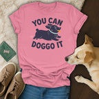 Pink t-shirt with navy text "YOU CAN DOGGO IT" and graphic of a dog.
