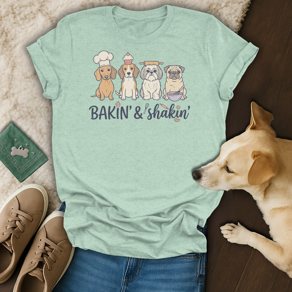 Light teal t-shirt with dogs in baking attire and text "BAKIN' & shakin'".