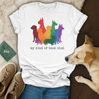 White t-shirt with rainbow dogs and text "my kind of book club."